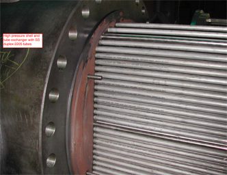 High pressure shell and tube exchanger tube bundle with stainless duplex 2205 tubes